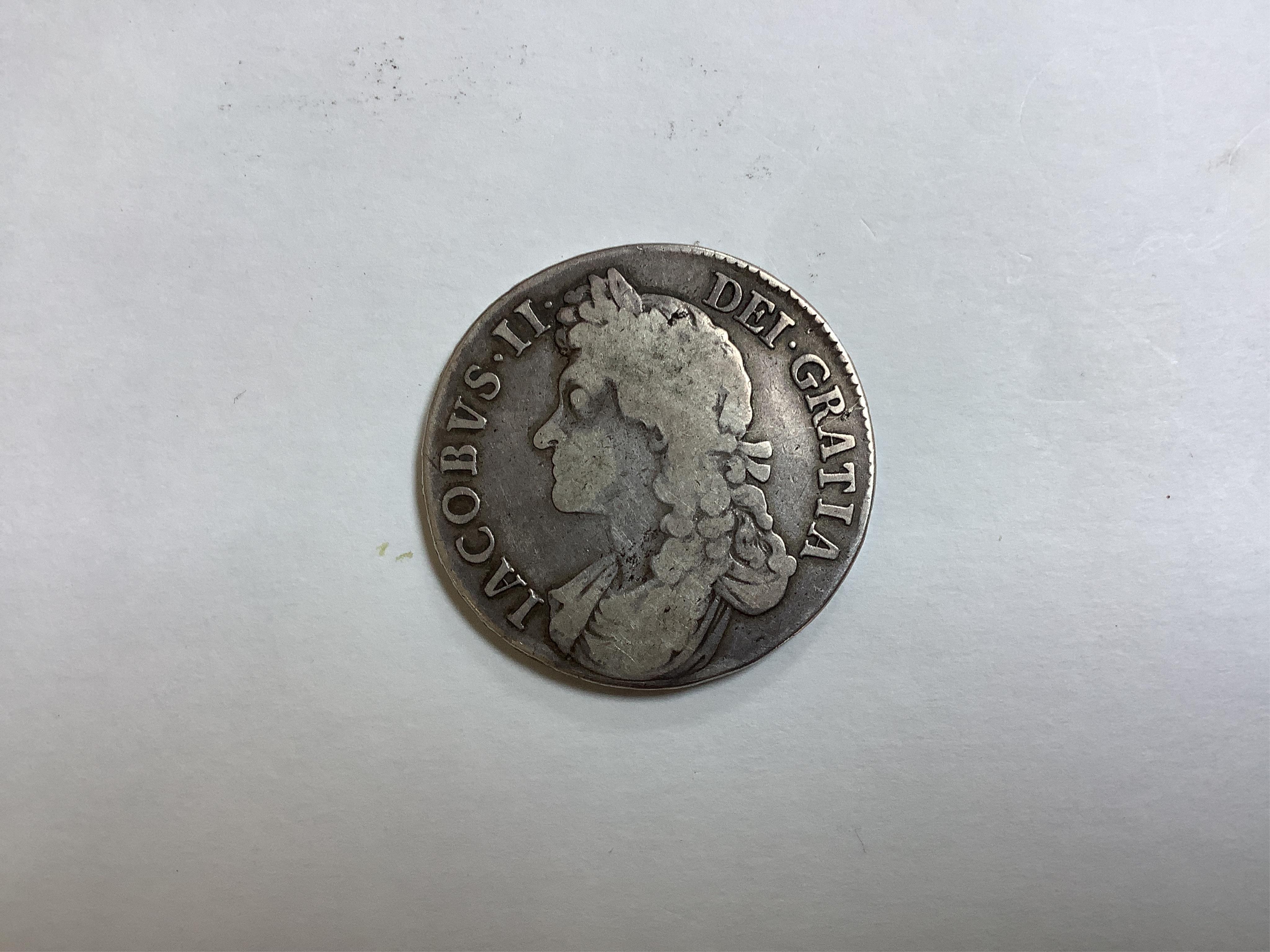 British silver coins, James II crown, 1687, scratch to portrait otherwise about fine